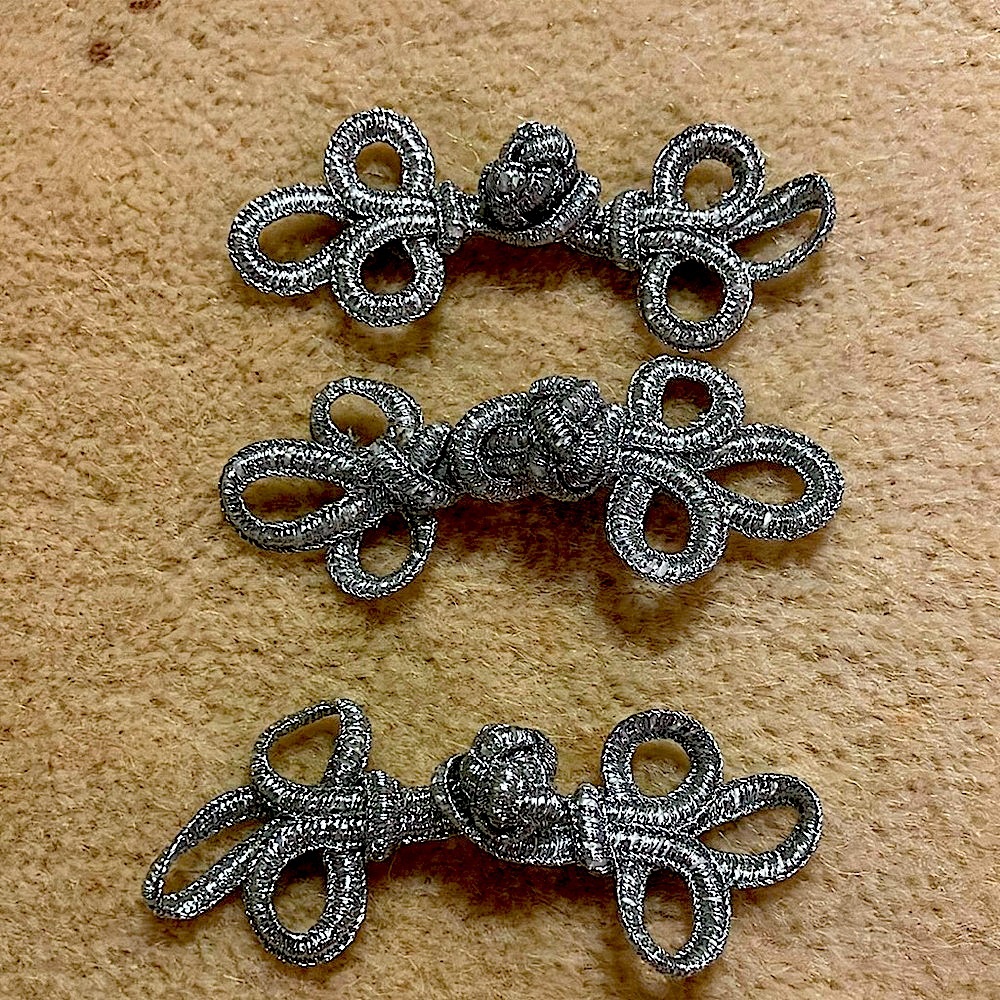 Elegant Metallic Silver Knot Embellishments 12 for $19